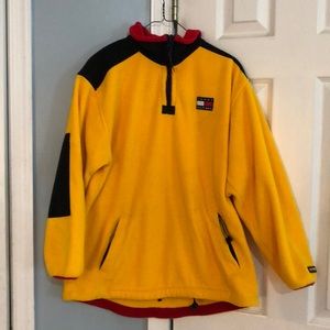 yellow and black Tommy Hilfiger pull over